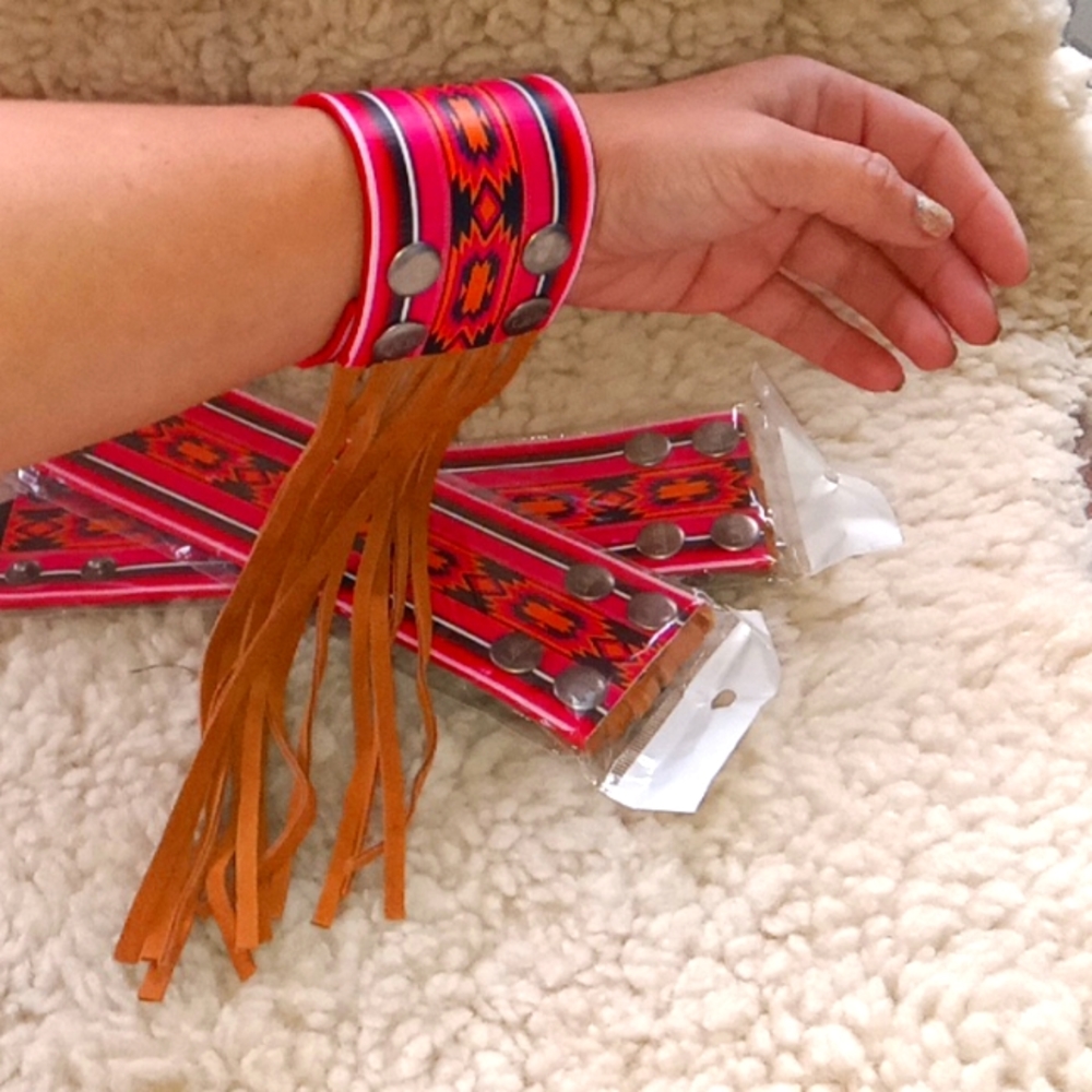 L and B Apparel leather and tassel wristlet!